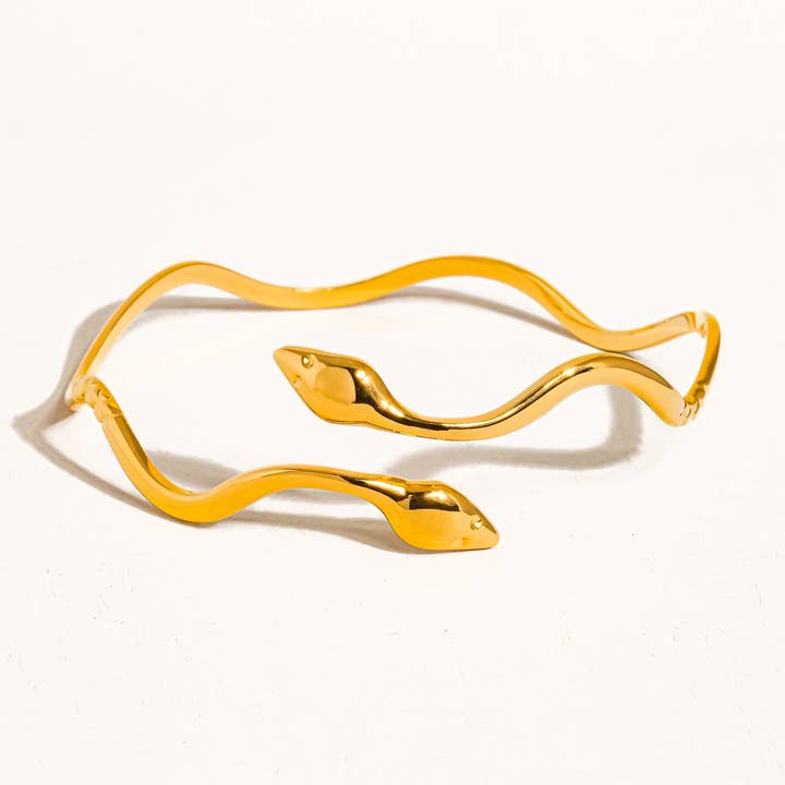 Zofia 18K Gold Non-Tarnish Wavy Serpent Bracelet and other Purchase Wholesale goldsun zonnebloemolie. Free Returns & Net 60 Terms on Faire trending on Faire.