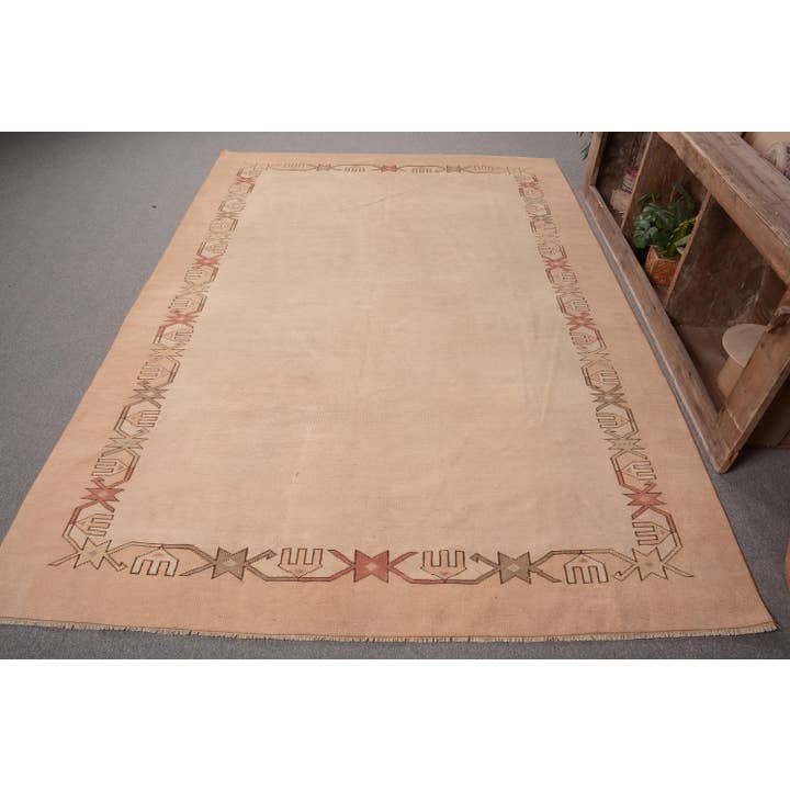 Handwoven Geometric Wool Rug in Beige for wholesale by The Loom Wholesale