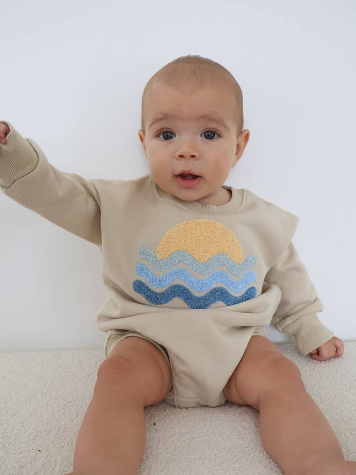 Barboteuse à bulles coucher de soleil pour la vente par Luna + Luca