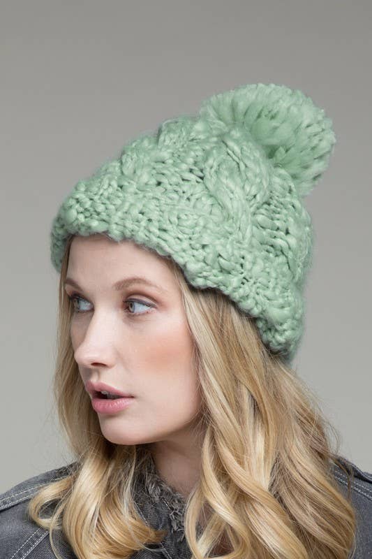 Menta Gorro grueso de punto trenzado hecho a mano con pompon de venta al por mayor en Faire1