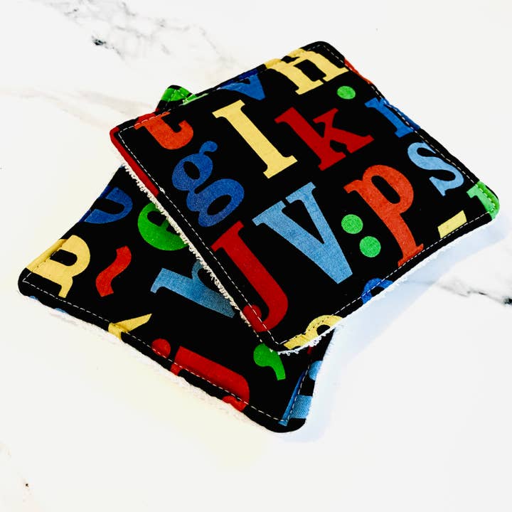 Colorful Letters on Black Unsponges (Bamboo Core) for wholesale by Crafted with Some Crazy