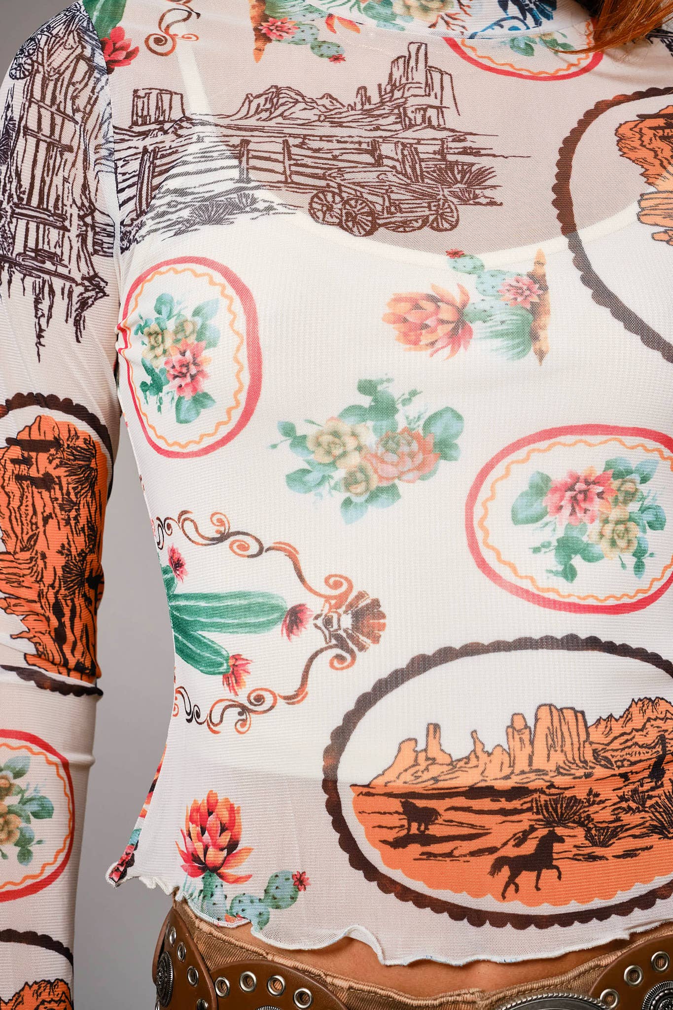 MULTI 33147T Western Motif Mesh Mock Neck Top for wholesale on Faire7