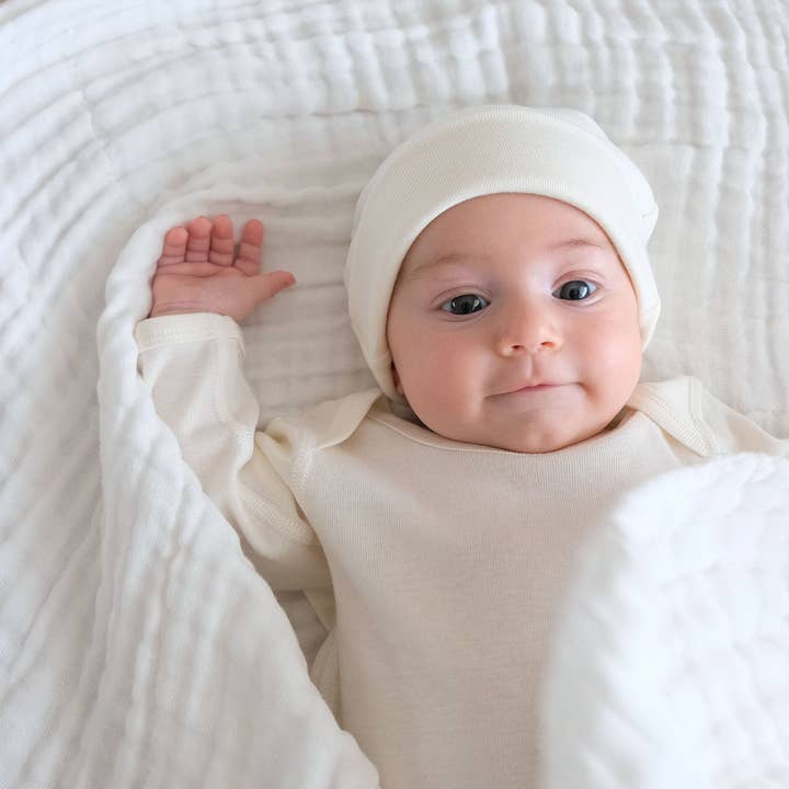 White Brown Undyed Organic Cotton Muslin Wrap - 2 Pack for wholesale on Faire