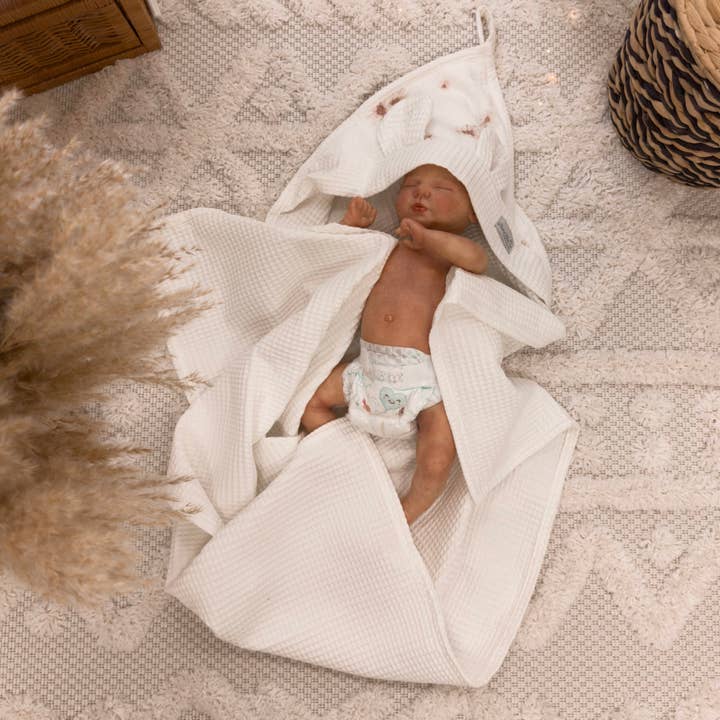 Hooded Bath Towel | Waffle | Daisies for wholesale by BabyNest