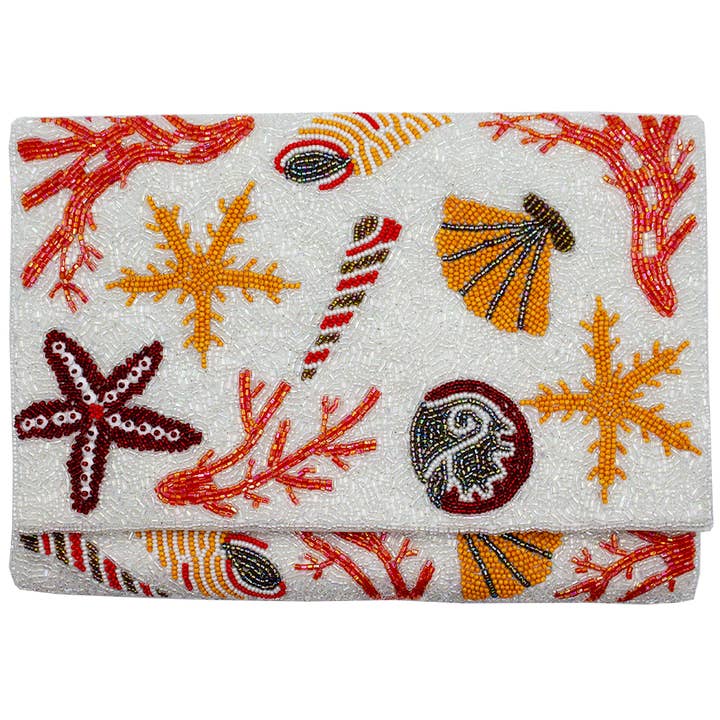 SÉRIE DE ARTISTAS DE CORAL E CONCHAS MARINHAS CLUTCH COM MISSANGAS DE DUPLA FACE por atacado de Pizzazz, Inc.