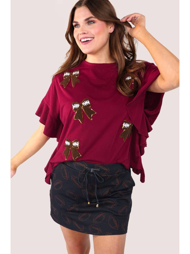 Sideline Sparkle Ruffle Top- Maroon for wholesale on Faire4