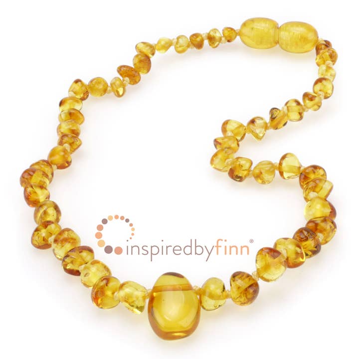 Polished Baltic Amber Necklace – Golden Pendant | 17 – 22” for wholesale by Inspired By Finn