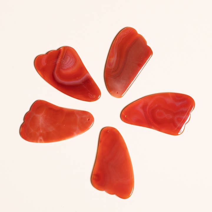 Karneol Gua Sha for engroshandel hos dhyana Essentials