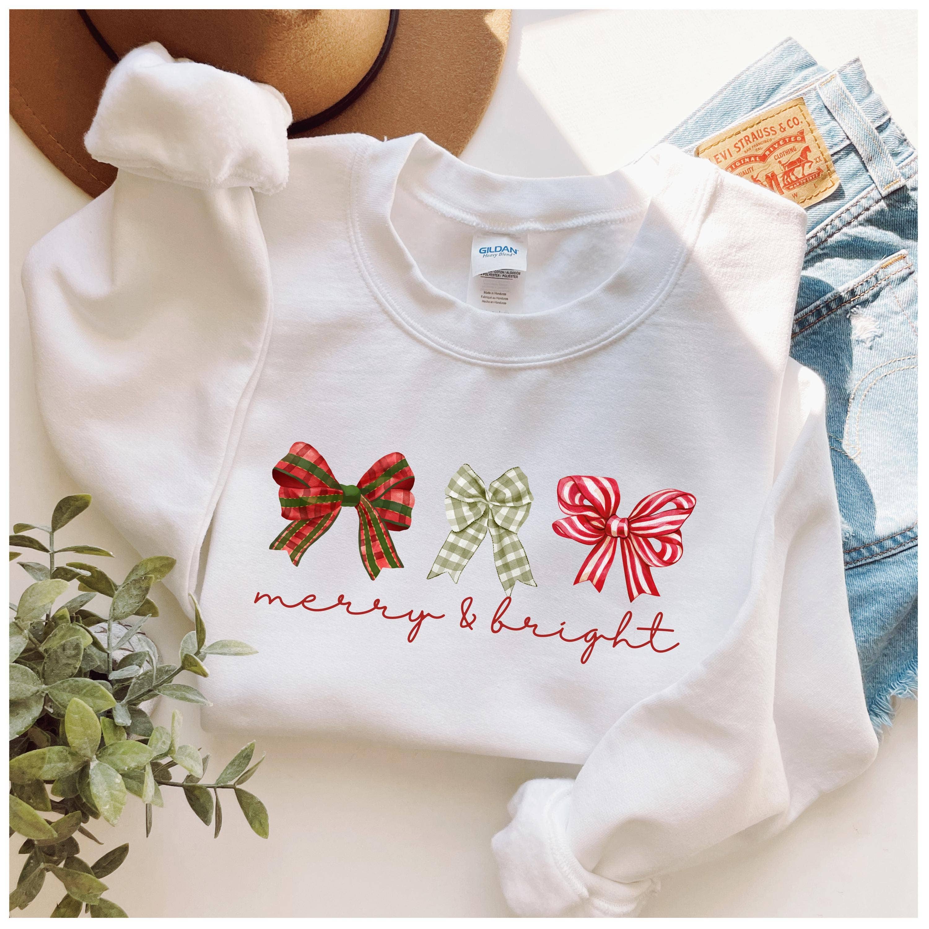 White Merry and Bright Three Bows Sweatshirt for wholesale on Faire2