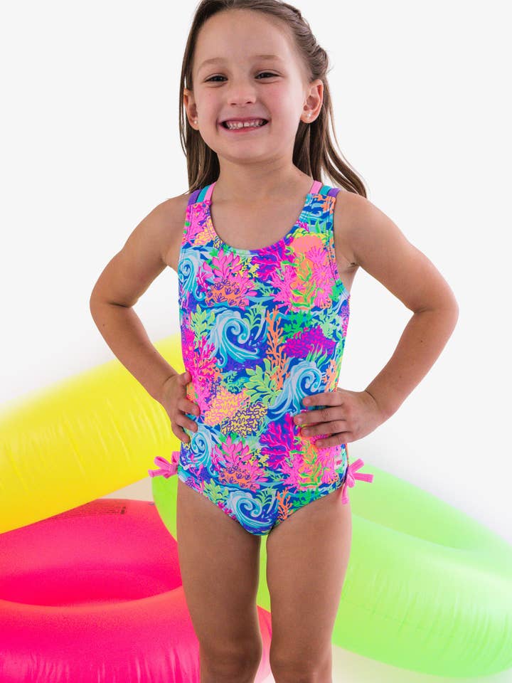 Girls Neon Ocean Coral Cross-Back One Piece Swimsuit
for wholesale by RuffleButts + RuggedButts