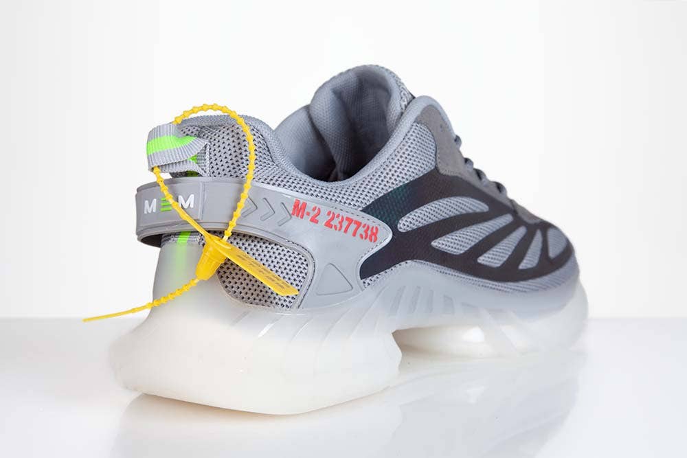 Grigio Sneakers lifestyle retroriflettenti grigie MEM - Unisex in vendita all'ingrosso su Faire2