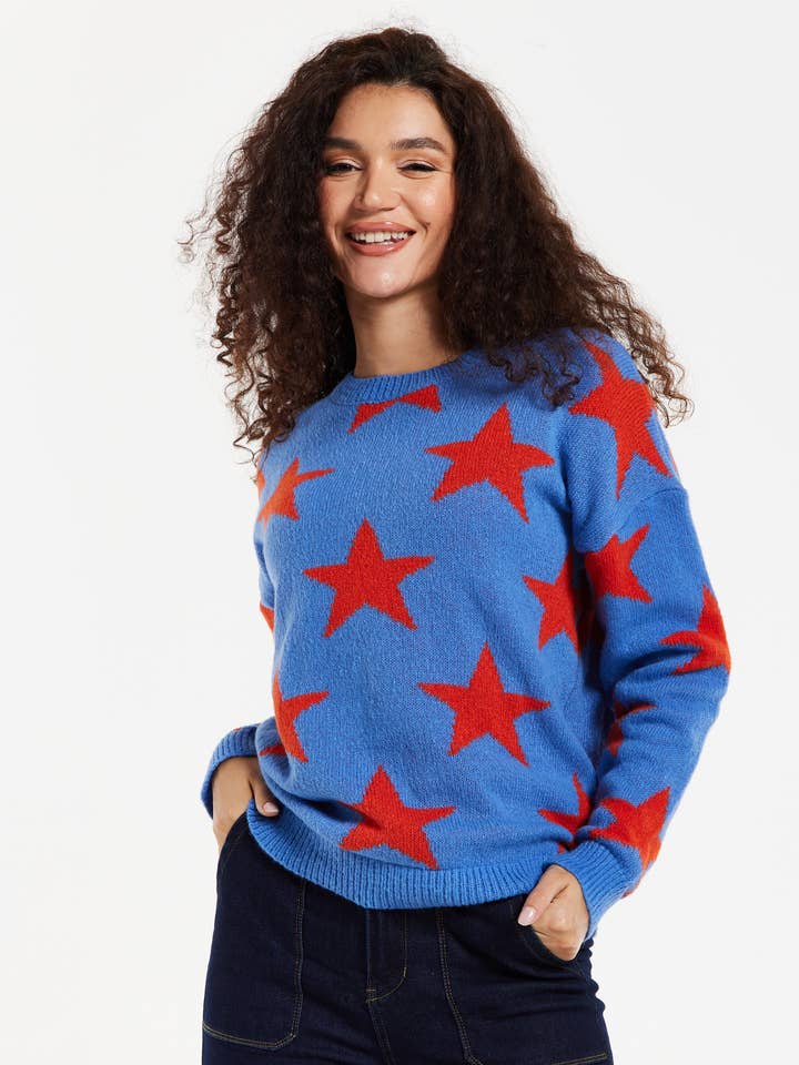 Liquorish Red Star Jumper In Blue for wholesale by Liquorish