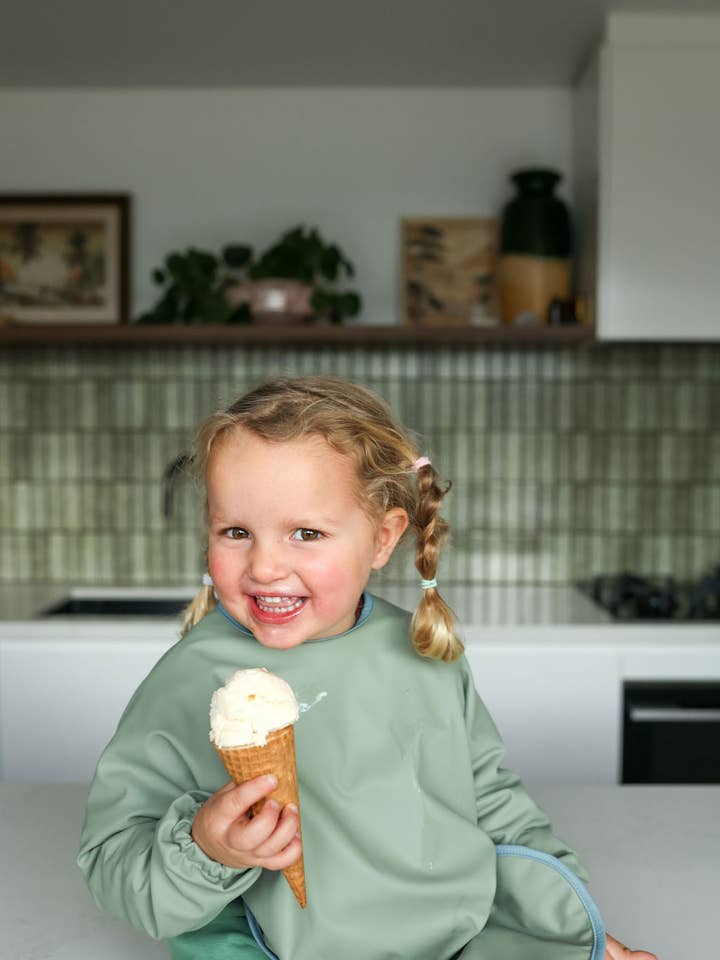 Pistachio Cream | Smock Bib for wholesale by Tilda & Moo