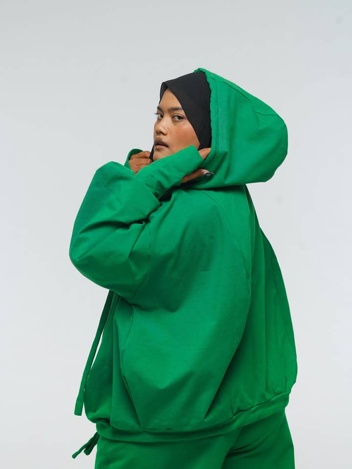 Hoodie Ballon Surdimensionné avec Zip en Vert Herbe pour la vente par Manners London