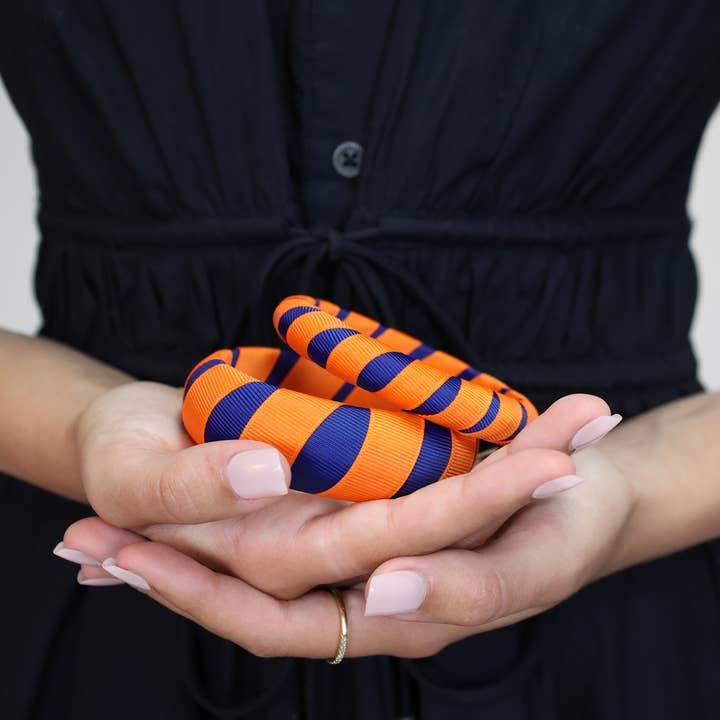 Toomer-armbåndet for engroshandel hos C. Tonsmeire