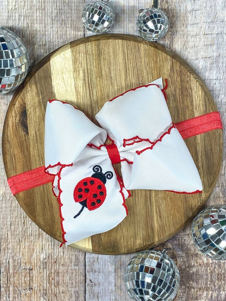 Ladybug Embroidered Moonstitch Bow Headband for wholesale by The Hair Bow Company