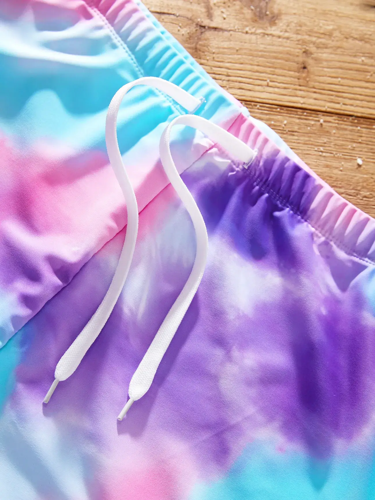Multi Colored Men's Tie-dyed Swim Trunks for wholesale on Faire4