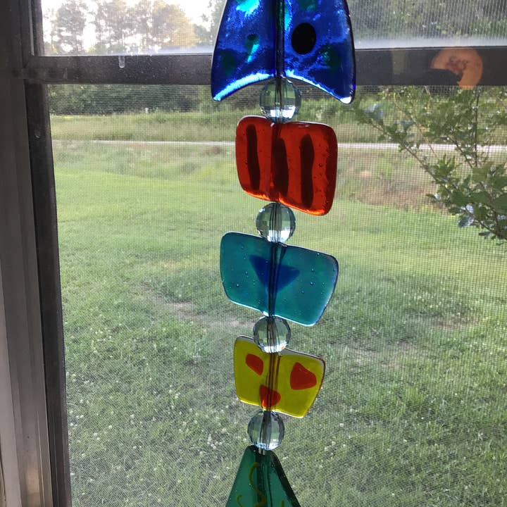 Diverse kleuren Damevis glazen vis mobiel, zonnevanger voor groothandel op Faire2