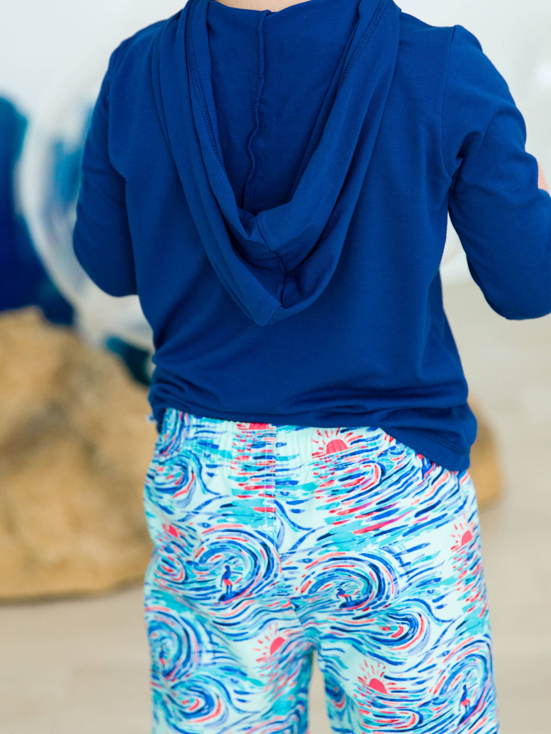 Blue Boys Seaside Surfer Swim Trunks for wholesale on Faire2