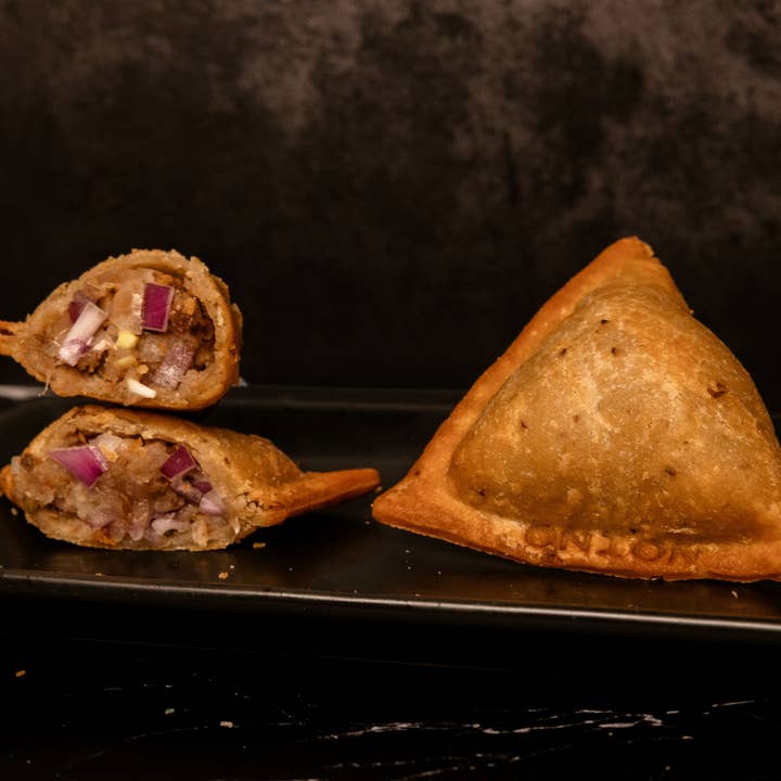 Onion Samosa Pocket (Uncooked) for wholesale by Seattle Samosa LLC