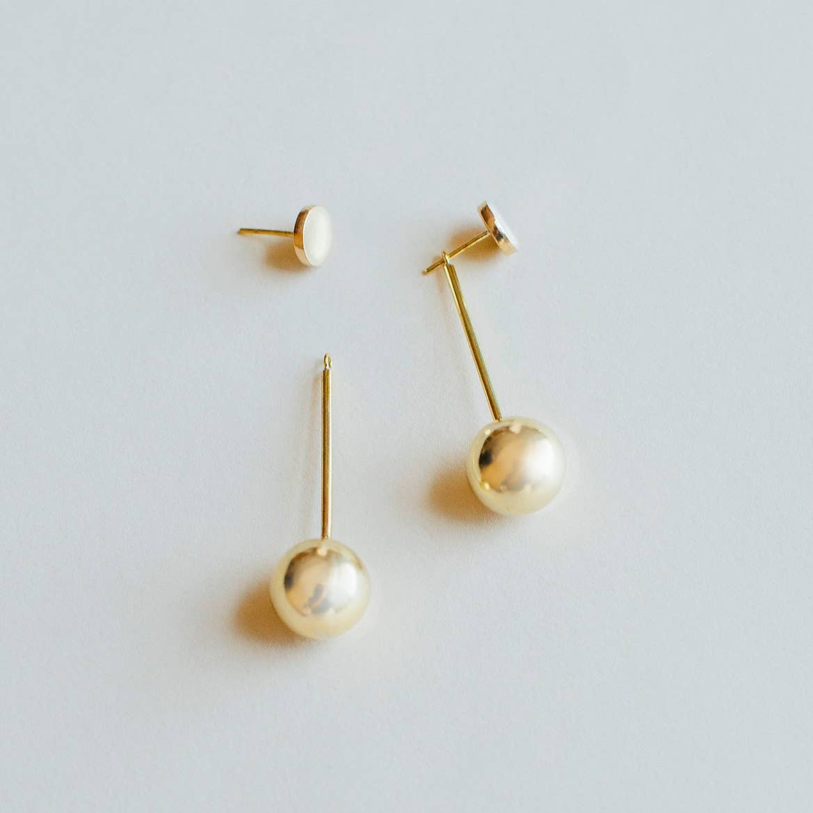 MULXIPLY - Wholesale Dangle Earrings - Strength Pendulum 2-in-1 Earrings | Brass4