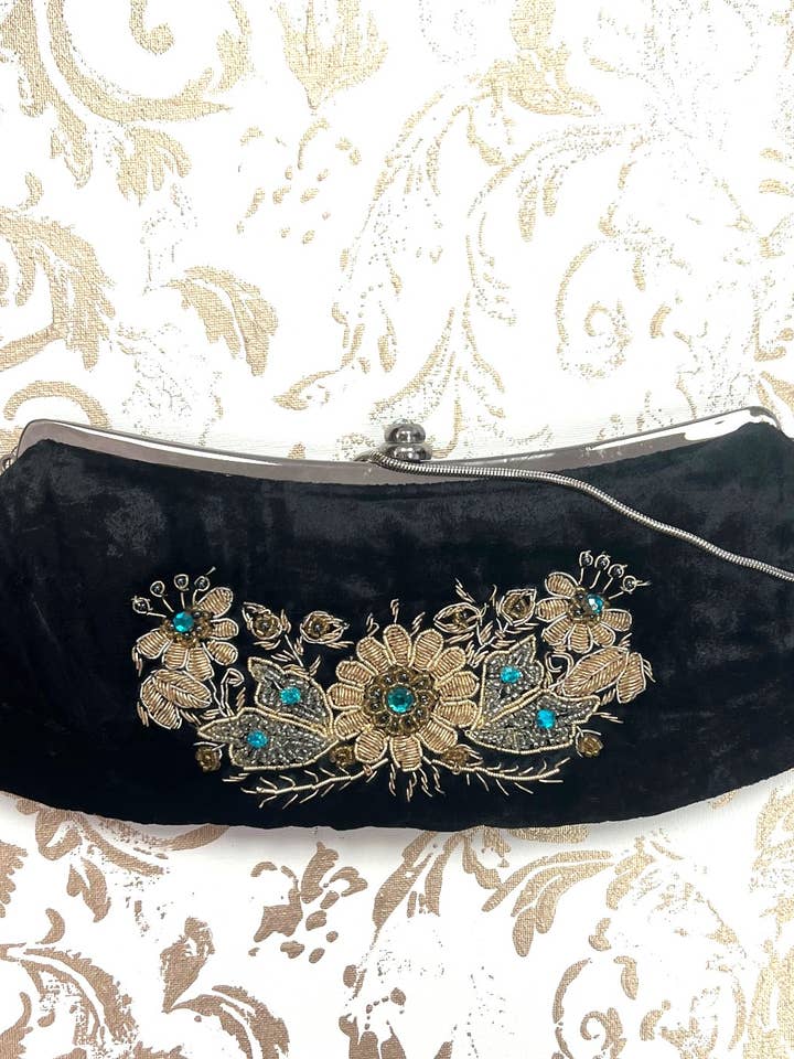Leather and Velvet metal frame floral embroidered clutch for wholesale by Ricki designs