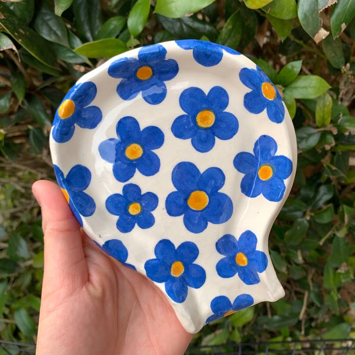 Blue Daisy Spoon Rest for wholesale by Howdy Ceramics
