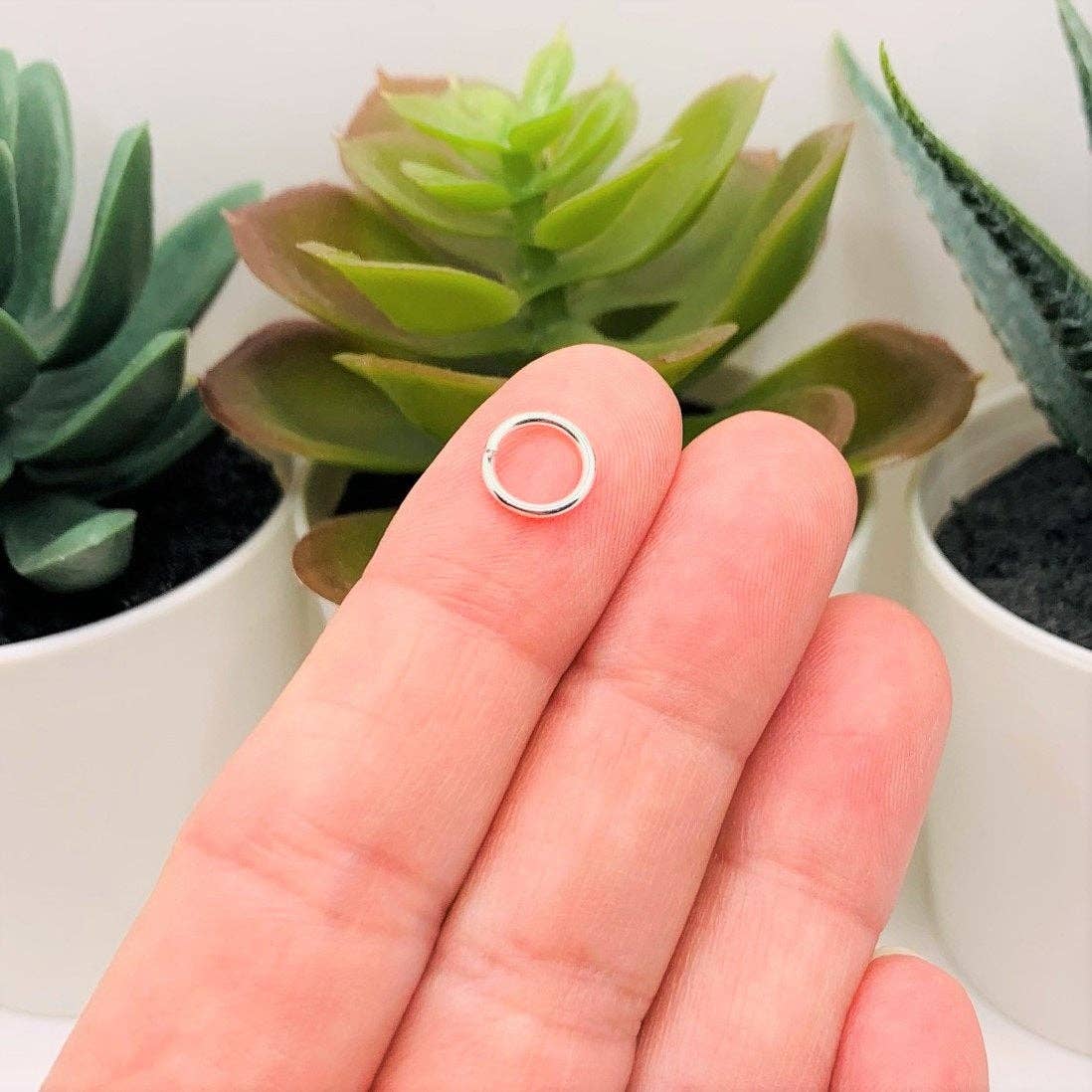 Guerrilla Charm - Wholesale Craft Supplies - 8mm, 18g, Silver plated Open Jump Rings1