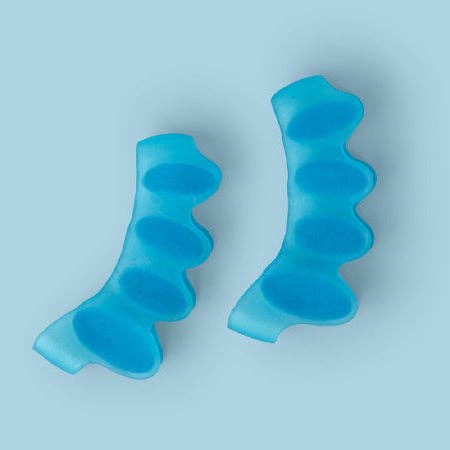 Réaligner les séparateurs d'orteils pour la vente par Tucketts