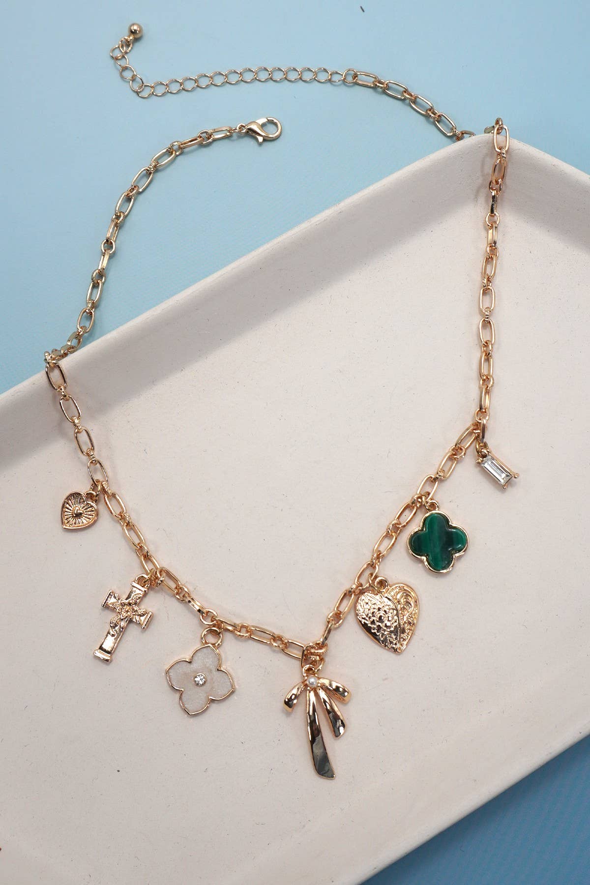 GOLD CHARM NECKLACE-GREEN CLOVER BOW CROSS HEART | 80N91991 for wholesale on Faire0