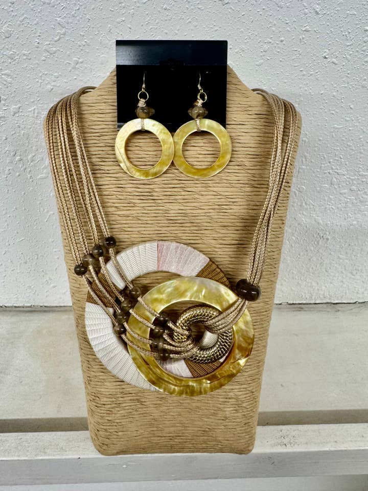 8 STRANDS NATURAL BROWN WAX CORD WITH MOP SHELL AND WHITE RO for wholesale by International Duru's