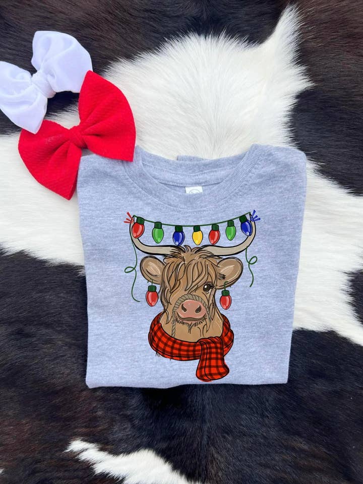 Christmas highland cow for wholesale by Buckin Baby Wholesale