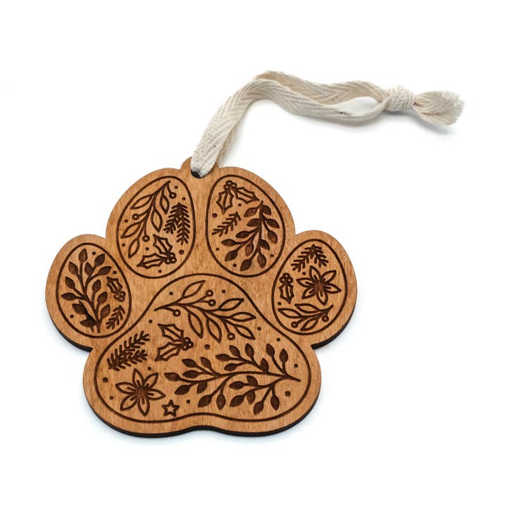 Festive Paw Print Engraved Wood Ornament for wholesale by Wildewood Handcrafted Goods