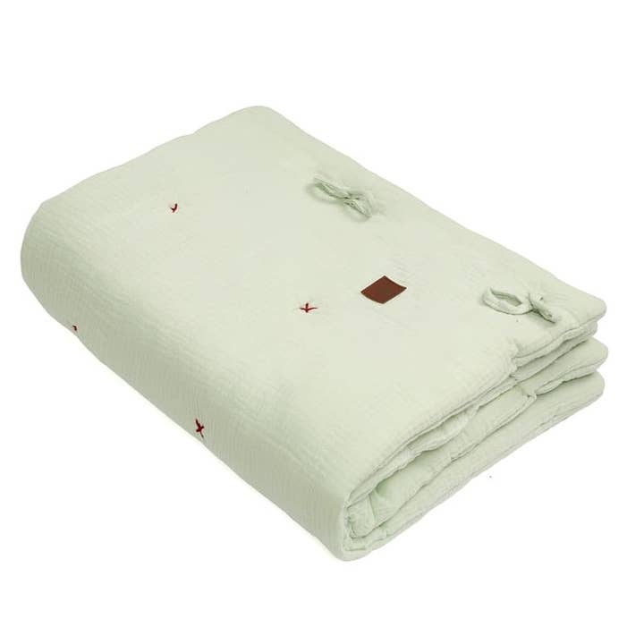 Menta Colcha de muselina bio con almohada Baby Horn Mint de venta al por mayor en Faire1