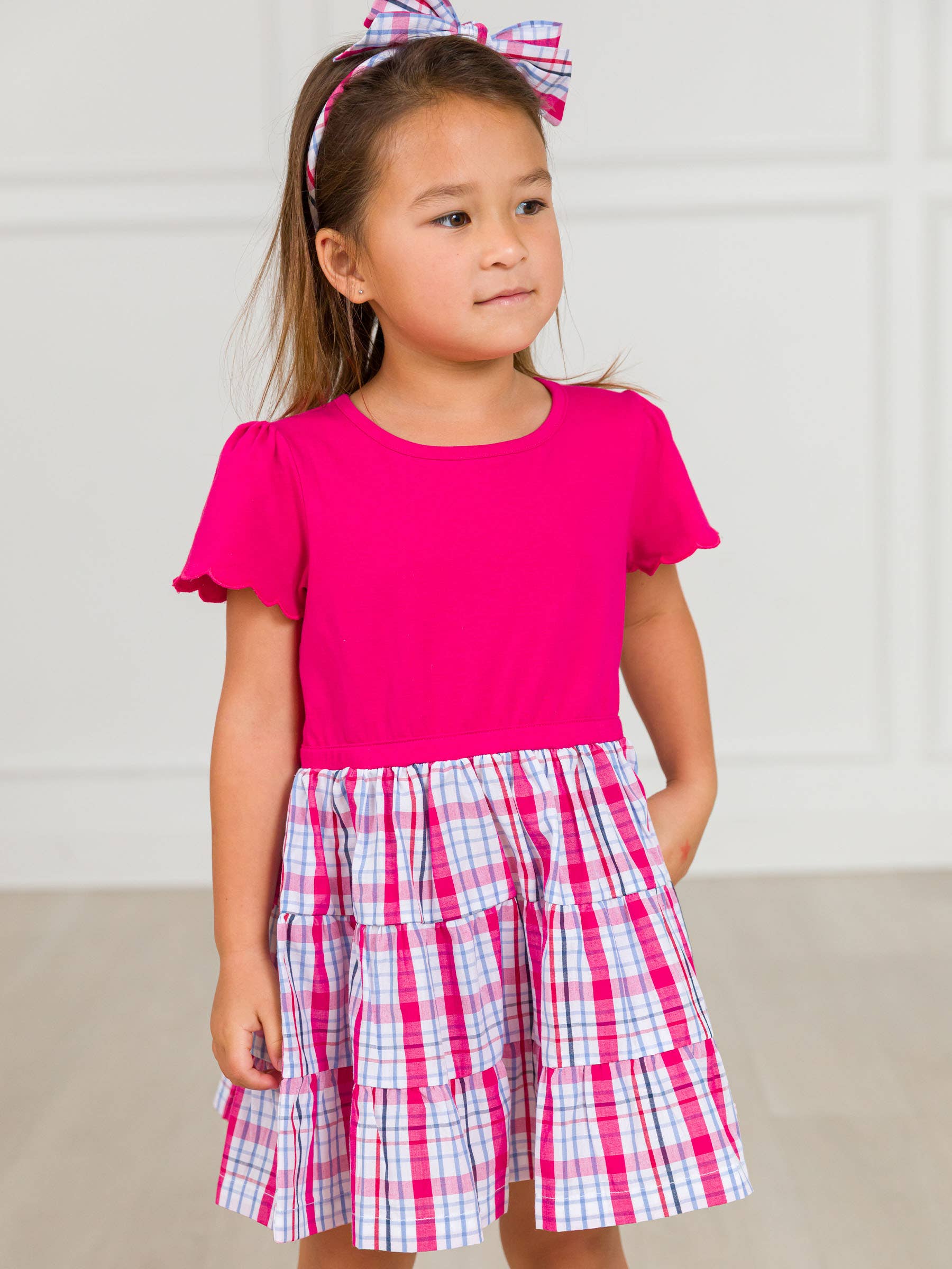 Pink Girls Adley Plaid Short Sleeve Tiered Dress for wholesale on Faire6