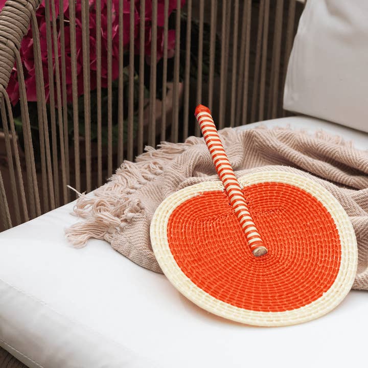 Handwoven Fan - Cream and Orange for wholesale by La Basketry