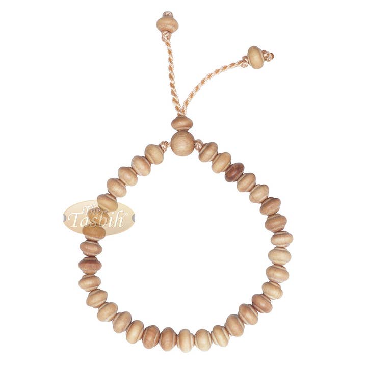 Small Handmade Adjustable Contoured-Bead Sandalwood Bracelet for wholesale by IndoMode