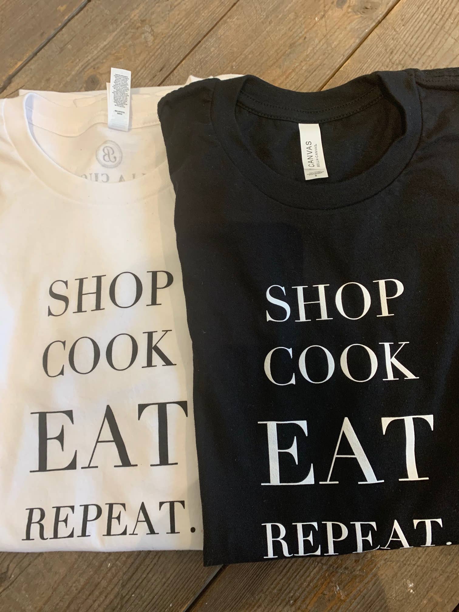Bella Cucina - Wholesale Screen Printed T-Shirt - Unisex - SHOP. COOK. EAT. REPEAT. Tee0