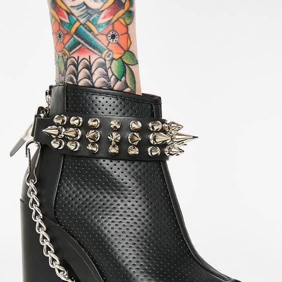 BS112 THREE ROW SPIKE BOOTSTRAP for wholesale by Funk Plus