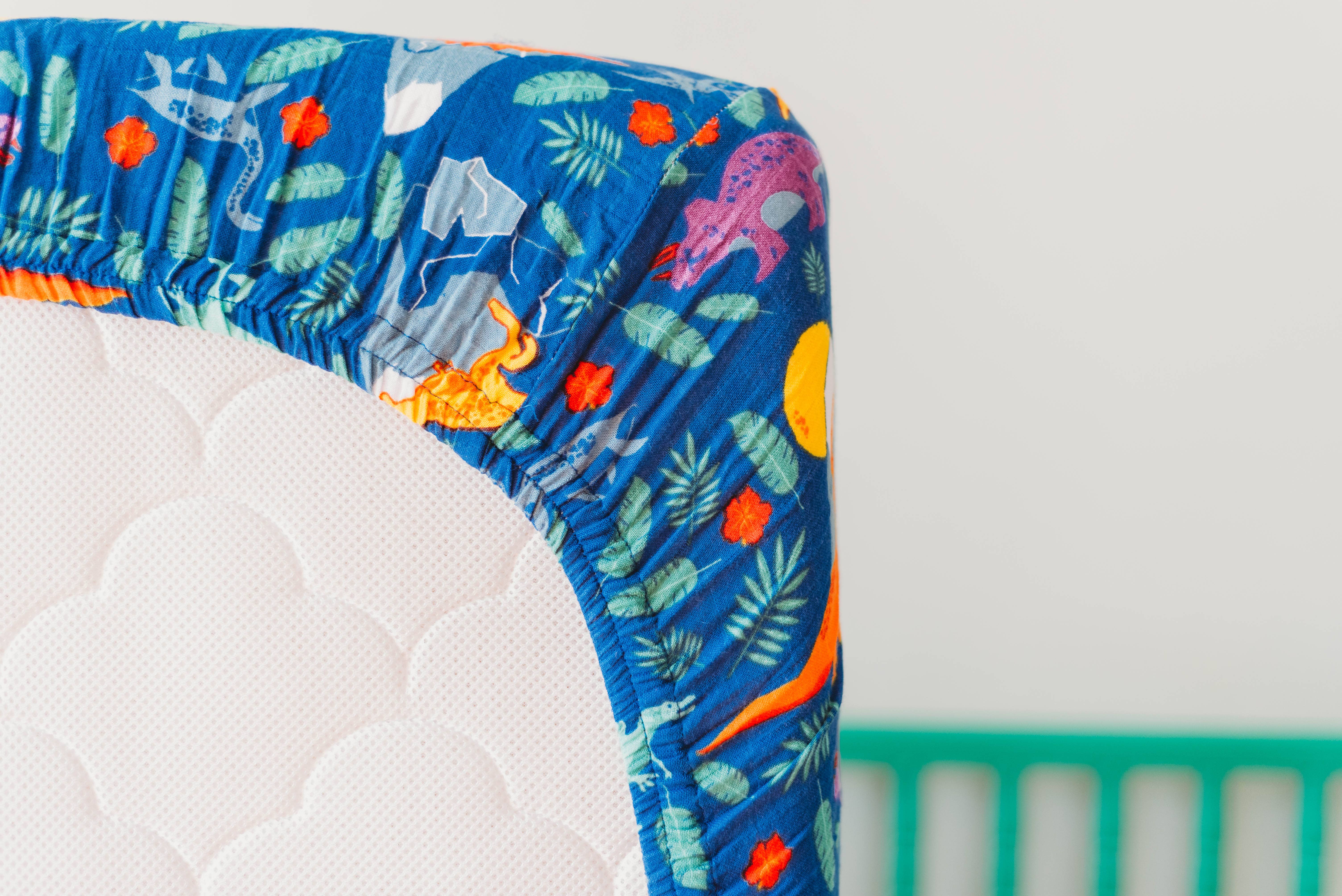 Oliver + Kit - Wholesale Cot/Crib Sheets - Rainbow Dino Fitted Crib Sheet3