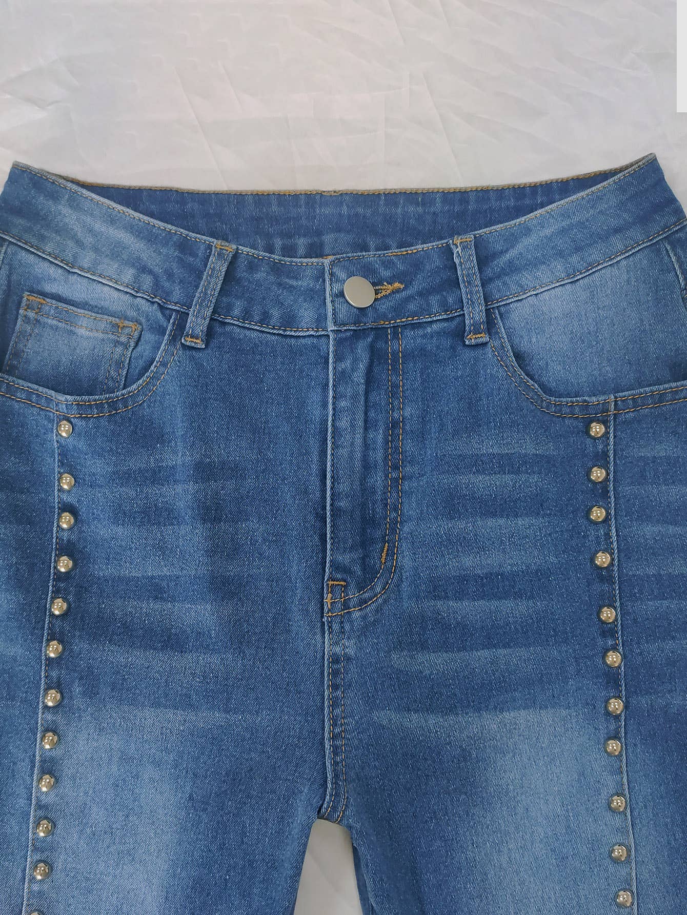 Blue High-waisted studded bootcut jeans for wholesale on Faire6