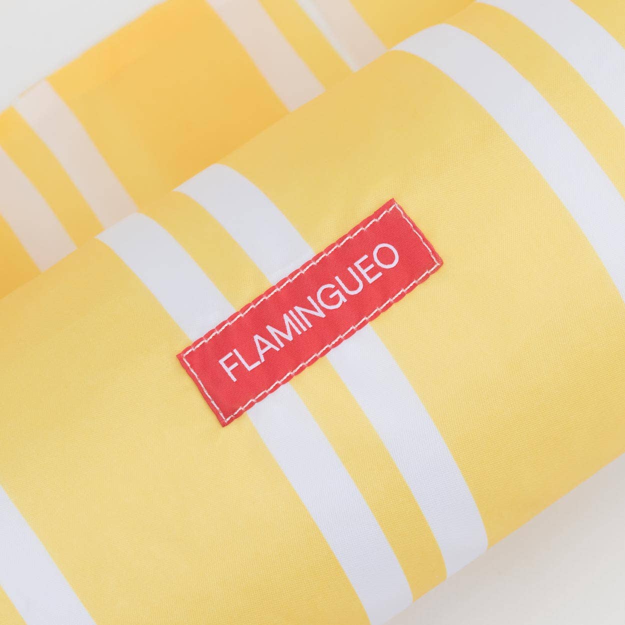 Flamingueo – wholesale Beach accessories – Yellow inflatable floating armchair with white stripes3