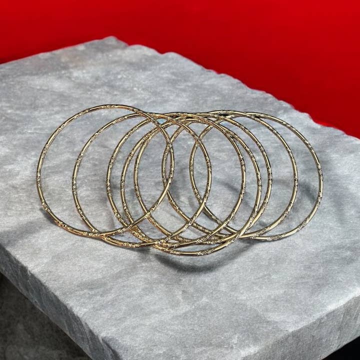 Divina Jewelry & Accessories LLC - Venta al por mayor Juegos de joyas - Pulseras de Brazalete Electrochapadas en Oro de 14k Semanario de 7 Días1