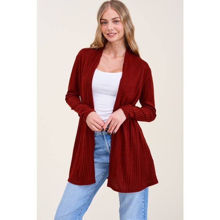 CARDIGAN A COSTINE IRREGOLARI IN TINTA UNITA CON TASCHE LATERALI per la vendita all'ingrosso da parte di Reborn J