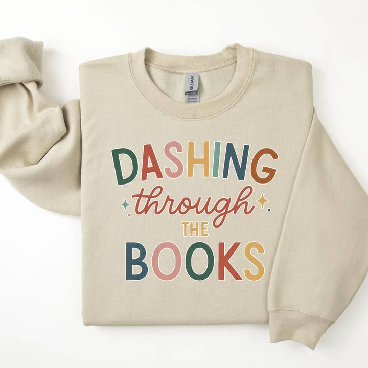 Felpa Natalizia Accogliente "Dashing Through the Books" per la vendita all'ingrosso da parte di The Obstinate Octopus