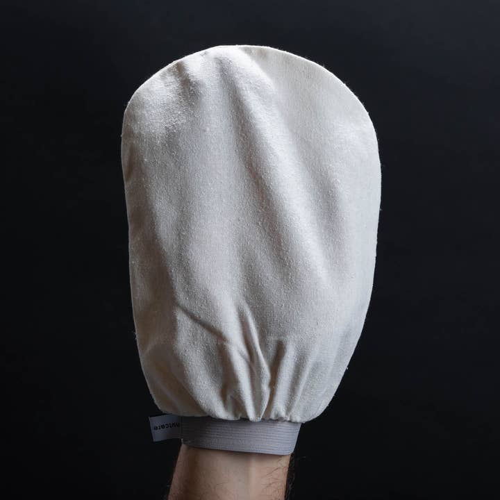 Silky nuts gentle exfoliator glove for wholesale by nutcare Australia