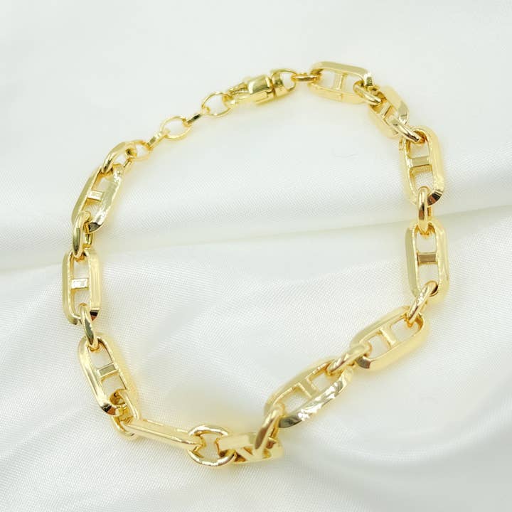 568861G Bracelet. 14K Yellow Hollow Gold Diamond Cut Marina Link Bracelet for wholesale by Jewels & Chains
