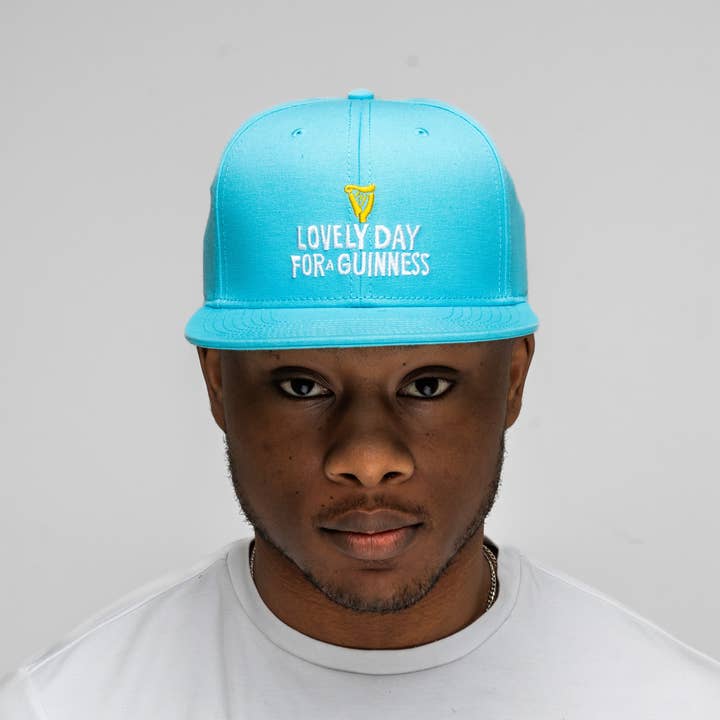 Guinness Summer Collection Lovely Day Flat Brim Cap - Blue for wholesale by James Trading Group INC