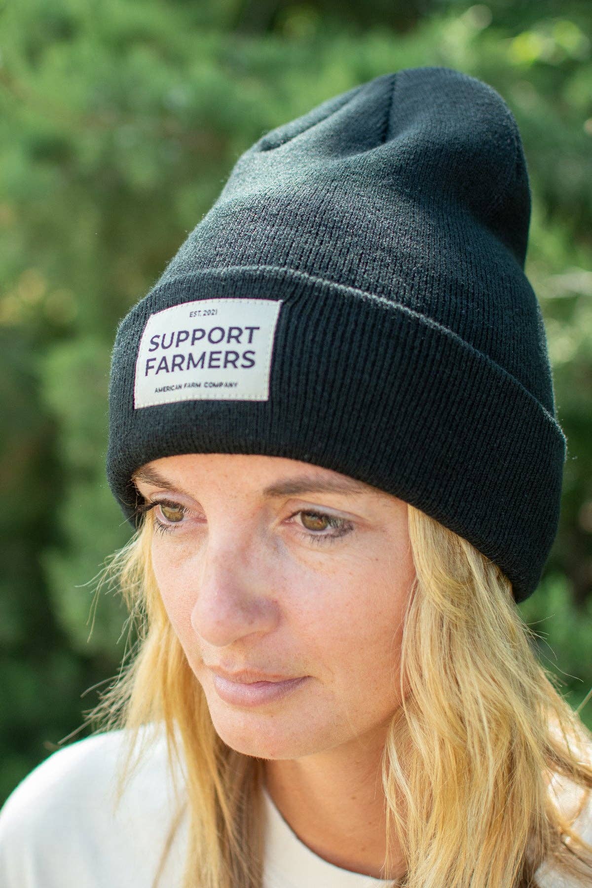Black ‘Support Farmers’ Beanie for wholesale on Faire3