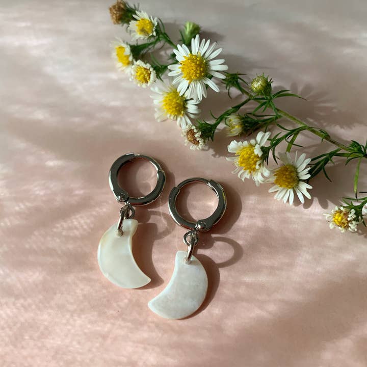 Mother of Pearl Moon Huggie Hoops for wholesale by New Moon Magic Studio
